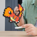 MEGA Pokémon, Blocos de Montar Charmander Estilo Retrô Pixelado com 349 peças, 15 cm de Altura, A Partir de 13 Anos
